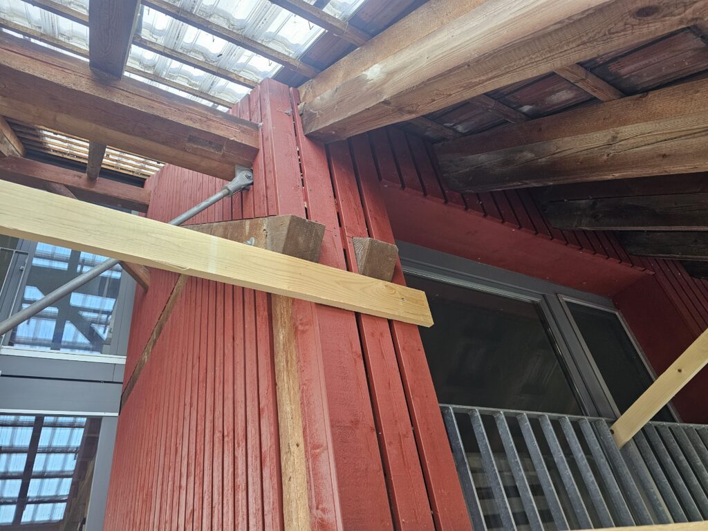 a wood beams and a window